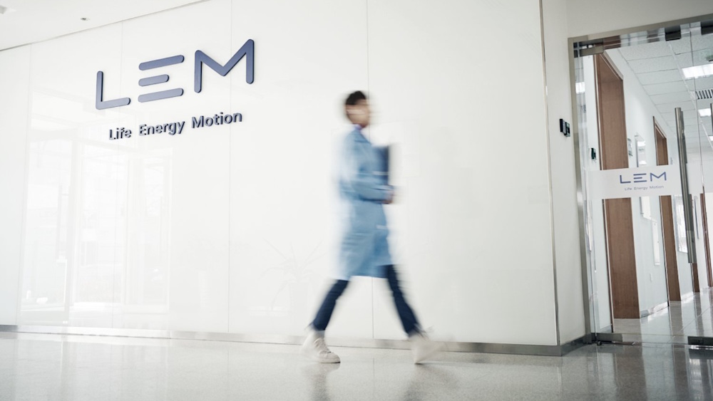 employee walking in LEM China office